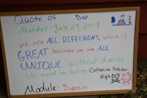 Camp Kupugani white board with quote of the day.