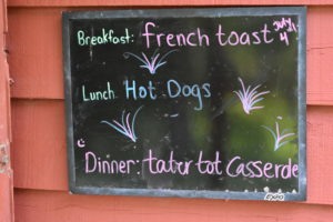 Camp Kupugani Chalk Board Menu For Breakfast, Lunch, and Dinner.