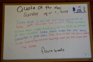 Camp Kupugani whiteboard with quote of the day written on it.