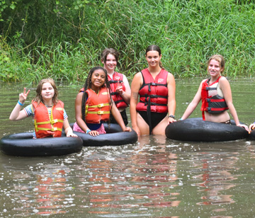 From river walks, river floats, waterfall & dam jumping, there is no better way to spend a hot summer day. A river walk or river float is the perfect activity for cooling off on a warm summer day. During a river walk, campers dressed in life jackets, shorts, t-shirts, and shoes walk the length of the river observing and interacting with the beings that consider the river their home. Campers celebrate the end of a river walk by floating down the river, taking a trip under our very own waterfall, or doing crazy jumps off the dam into our 18-foot deep lake.